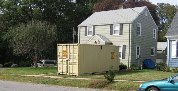 beige storage container outside home